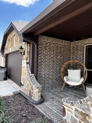 Install in Lancaster, Tx - We helped this home maintain its curb appeal by tucking the downspout behind the decorative wall and run behind the flower bed. Install in Lancaster, Tx - We helped this home maintain its curb appeal by tucking the downspout behind the decorative wall and run behind the flower bed.