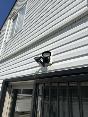 Ring Floodlight Install - The client had two existing lights in the front and back of the house. We repurposed the lights and made them ring floodlight with a camera. Ring Floodlight Install - The client had two existing lights in the front and back of the house. We repurposed the lights and made them ring floodlight with a camera.
