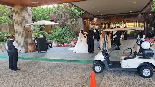 Wedding - Country Club 2022 - Wedding for 300 guests. Cars were received at main front door and guests taken by golf cars to the ceremony in the backyard. All valet operation was completed smooth and accomplished according to the job plan.