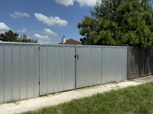 Sheet Metal fence - We replace a privacy fence with sheet metal