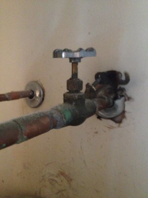 New Water Shut-Off Valve - We arrived to find that the old Gate valve was broken off at the stem and was not shutting off the water to the Water Heater. So we turned the water main off and soldered on a new 1/4 turn Ball Valve. New Water Shut-Off Valve - We arrived to find that the old Gate valve was broken off at the stem and was not shutting off the water to the Water Heater. So we turned the water main off and soldered on a new 1/4 turn Ball Valve.