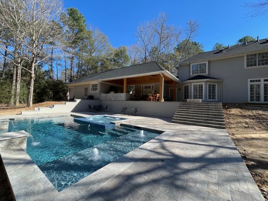 The Halverson Residence - Beautiful covered patio, grand staircase down to the pool and spa.  Steplights, outdoor kitchen, paver deck.  This job had it all.