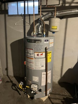 Water heater replacement in a basement - Customer called upset and concerned having no hot water. With a quick in person free assessment, old water heater was quickly deemed inoperable and replacement was necessary. With same-day service, new water heater was purchased and installed as the old one was removed and disposed of. With a total of 11 years warranty and  an expansion tank addition, this customer is in great shape!