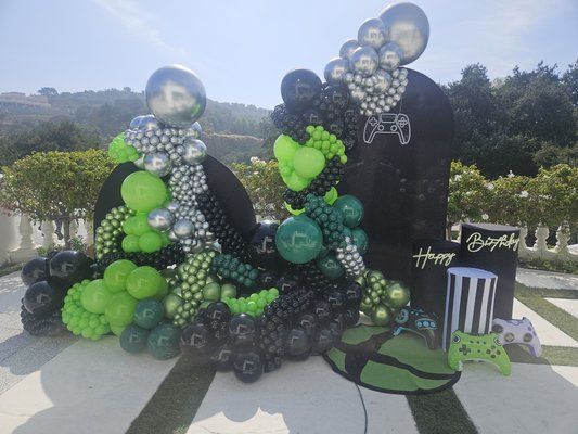 Gamers 🎮 "Game On" Balloon Design - Game On! Your Party Starts Here.
Our custom balloon packages are designed to transform any event with style, color, and creativity. Whether you want elegant, fun, glam, or themed décor, T.WilsonEvents will make it unforgettable. Let’s bring your ideas to life! Gamers 🎮 "Game On" Balloon Design - Game On! Your Party Starts Here.
Our custom balloon packages are designed to transform any event with style, color, and creativity. Whether you want elegant, fun, glam, or themed décor, T.WilsonEvents will make it unforgettable. Let’s bring your ideas to life!