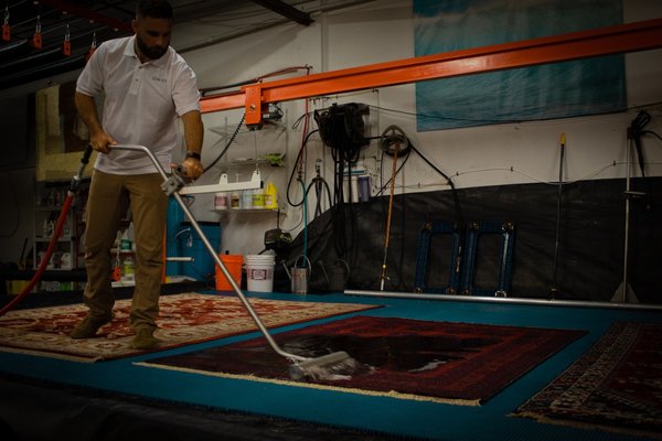 Immersion Area Rug Cleaning - Here's a peak behind the curtain of our 5,000 Square Foot State-of-the-Art Rug Cleaning Facility which is run by our team of WoolSafe Certified Professionals!