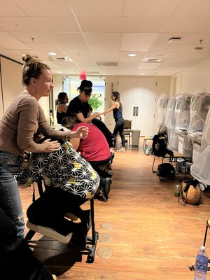 Chair Massage - We bring our team of chair massage specialists to your corporate event, large or small gathering, anniversary party or bridal event. Our expert therapists travel islandwide to accommodate your group experience Chair Massage - We bring our team of chair massage specialists to your corporate event, large or small gathering, anniversary party or bridal event. Our expert therapists travel islandwide to accommodate your group experience