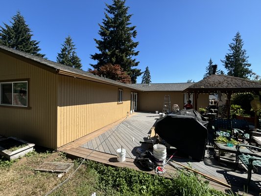 Project: DenBeste Exterior - This home was in rough condition, with wood rot requiring some siding replacement and extensive areas where peeling paint needed to be scraped and primed. After completing all the repairs and prep work, the result was a stunning paint job in beautiful earth tone colors.
