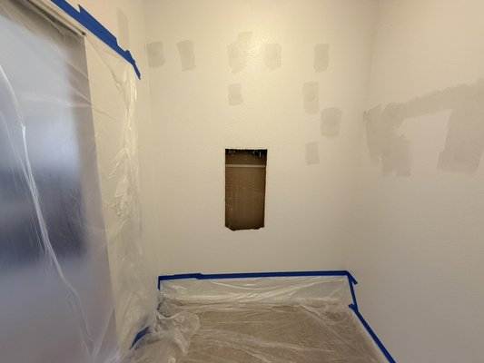Drywall repair, texture and pain - Control panel removed and drywall patched and repaired. Drywall repair, texture and pain - Control panel removed and drywall patched and repaired.
