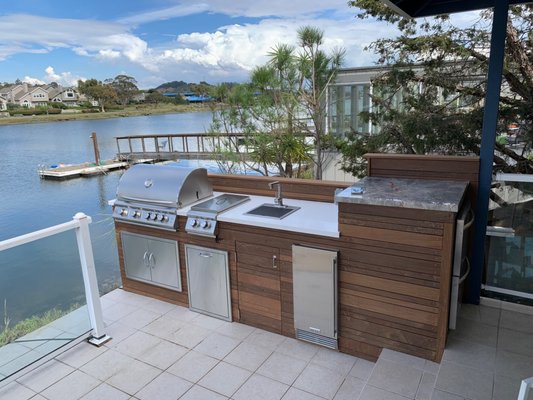 Larkspur Outdoor Kitchen and Deck - 11' long outdoor kitchen constructed with Epi wood features a gas grill, gas burner, sink, refrigerator, icemaker, storage as well as garbage and recycling drawer.
1,400 square foot deck constructed of PTDF and Trex. Raised patios sections are constructed of tile surface. from the deck. Assisted with furniture and planter selection .
Constructed by Llamas Building Crew. Larkspur Outdoor Kitchen and Deck - 11' long outdoor kitchen constructed with Epi wood features a gas grill, gas burner, sink, refrigerator, icemaker, storage as well as garbage and recycling drawer.
1,400 square foot deck constructed of PTDF and Trex. Raised patios sections are constructed of tile surface. from the deck. Assisted with furniture and planter selection .
Constructed by Llamas Building Crew.