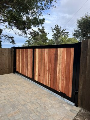 Sliding Gate - This is a Sliding metal gate with wood Sliding Gate - This is a Sliding metal gate with wood