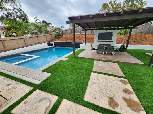 Glendale Dr Luxury Outdoor Living - Luxury outdoor living project with new pool, TV entertainment wall with built-in fireplace, artificial turf, and outdoor kitchen! Glendale Dr Luxury Outdoor Living - Luxury outdoor living project with new pool, TV entertainment wall with built-in fireplace, artificial turf, and outdoor kitchen!