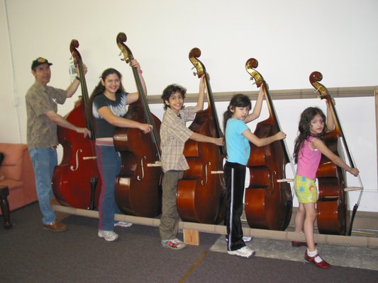 Selling and Servicing upright basses of all sizes and grades. - Most people that are new to upright bass have no idea what is meant by 4/4 or full size bass compared to a 3/4 bass or smaller.
We make it easy to find out what's what and allow you to quickly see what will work for you. We have seen so many professional and beginner upright bass players come thru the store we have a pretty good idea what people need to learn about the basses available to zero-in on one to meet their needs. Selling and Servicing upright basses of all sizes and grades. - Most people that are new to upright bass have no idea what is meant by 4/4 or full size bass compared to a 3/4 bass or smaller.
We make it easy to find out what's what and allow you to quickly see what will work for you. We have seen so many professional and beginner upright bass players come thru the store we have a pretty good idea what people need to learn about the basses available to zero-in on one to meet their needs.