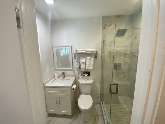 Bathroom Remodel Sherman Oaks - The client wanted to remove their outdated bathtub and upgrade to a modern walk-in shower. Our team first removed the old tub and properly disposed of it. We then installed a new, larger shower base and built a custom tiled surround to give the space a fresh and updated look. We also added a frameless glass shower door to further open up the space and make it feel larger. We also installed new plumbing fixtures, a new vanity and countertop, new tile flooring, and new recessed lights. The end result was a beautiful and functional bathroom that exceeded the client's expectations. This project exemplifies our attention to detail and commitment to quality workmanship. Bathroom Remodel Sherman Oaks - The client wanted to remove their outdated bathtub and upgrade to a modern walk-in shower. Our team first removed the old tub and properly disposed of it. We then installed a new, larger shower base and built a custom tiled surround to give the space a fresh and updated look. We also added a frameless glass shower door to further open up the space and make it feel larger. We also installed new plumbing fixtures, a new vanity and countertop, new tile flooring, and new recessed lights. The end result was a beautiful and functional bathroom that exceeded the client's expectations. This project exemplifies our attention to detail and commitment to quality workmanship.