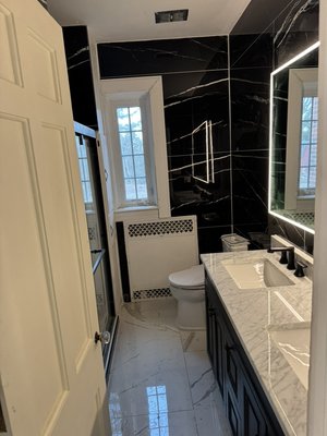Tile work - This was a remodel of a bathroom 200 ft.² new tile floor new tile walls new vanity mirror shower doors Tile work - This was a remodel of a bathroom 200 ft.² new tile floor new tile walls new vanity mirror shower doors