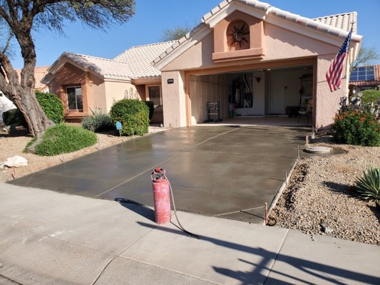 driveway - we removed the customer's old driveway and repourd, and finished it.