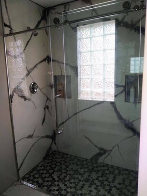 Bathroom remodel - This remodel was done on a bathroom that was in bad shape. These are fully custom epoxy panels  we made and installed.