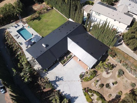Black standing seam metal roof in Fullerton, CA. - 🔨 New Roof Alert – Fullerton, CA! 🔨
We just wrapped up a brand new standing seam metal roof installation on a beautiful home in Fullerton! This sleek and durable roofing system offers top-tier protection, energy efficiency, and a modern look that will last for decades. Another quality job done right! 👷♂️🏠
The existing roof was a clay tile roof. Check out this before and after!
Are you interested in a complimentary estimate for your residential or commercial property? Give us a call at (714) 752-6999 for one, today! Black standing seam metal roof in Fullerton, CA. - 🔨 New Roof Alert – Fullerton, CA! 🔨
We just wrapped up a brand new standing seam metal roof installation on a beautiful home in Fullerton! This sleek and durable roofing system offers top-tier protection, energy efficiency, and a modern look that will last for decades. Another quality job done right! 👷♂️🏠
The existing roof was a clay tile roof. Check out this before and after!
Are you interested in a complimentary estimate for your residential or commercial property? Give us a call at (714) 752-6999 for one, today!