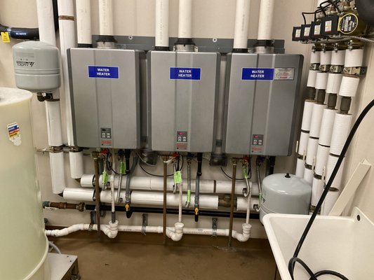 3 Tankless Water Heaters - The old water heaters at this medical clinic were leaking. Our team supplied and installed 3 new tankless water heaters for them. If you are in need of a water heater service contact our team today! 3 Tankless Water Heaters - The old water heaters at this medical clinic were leaking. Our team supplied and installed 3 new tankless water heaters for them. If you are in need of a water heater service contact our team today!