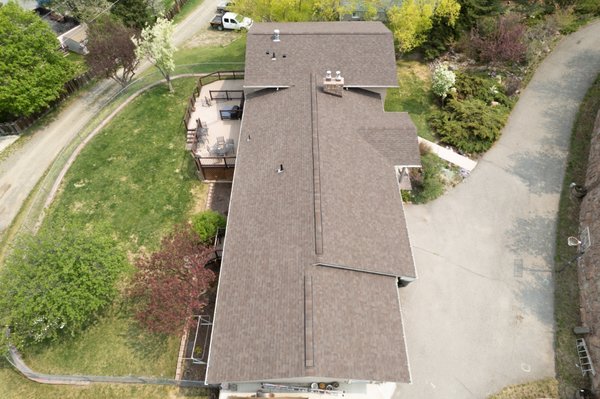 Helena Roof Replacement - South Hills, Helena, Montana. We tore off about 40sq in one day and dried in the roof. Day 2 was the installation. Customers previously had major issues around their chimney at multiple points. When we tore off, we found out there wasn't any step flashing installed around the chimney, causing the leaks.
Malarkey Roofing Profucts
Shingle: Malarkey Vistas
Color: Heather Helena Roof Replacement - South Hills, Helena, Montana. We tore off about 40sq in one day and dried in the roof. Day 2 was the installation. Customers previously had major issues around their chimney at multiple points. When we tore off, we found out there wasn't any step flashing installed around the chimney, causing the leaks.
Malarkey Roofing Profucts
Shingle: Malarkey Vistas
Color: Heather