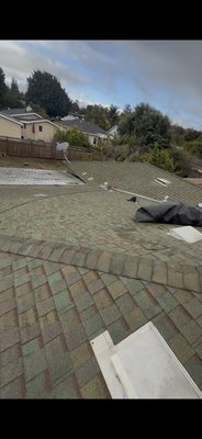 New Roof Installation - Full re roof in Menlo Park as part of a full home renovation project. We did some light demo and framing work, repaired damaged sheathing, added fascia and a new 40 year Certainteed shingles roof in Moire Black.