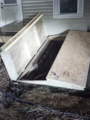 cellar door - we removed a rotting cellar door and handmade a brand door one. we also made it so that it opens two ways and not just one. cellar door - we removed a rotting cellar door and handmade a brand door one. we also made it so that it opens two ways and not just one.