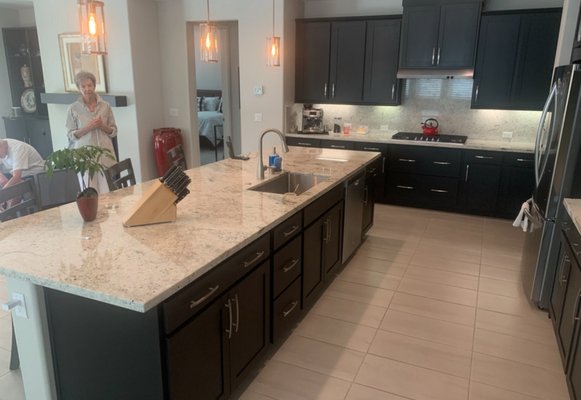 Cabinet color change from white to black satin finish. - This was a color change on kitchen cabinets that originally had a  white finish.My client wanted it changed to black when they bought the house so we did a satin finish.