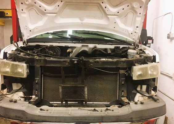 2003 Chevy Express G3500 Complete A/C Repair - Here is 2003 Chevy Express G3500 that came in with A/c not working. After close diagnostic along with freeon dye test, it was found that a/c condenser was leaking and along with that A/C compressor lost almost all oil and was damaged. We replaced all defective parts along with New accumulator and orphis tube  and recharged the vehicle with manufacture specified amount of freeon. Vehicle was blowing nice and cold at the end and customer was happy to be COOL again.