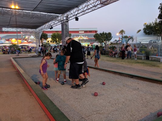 Antelope Valley Fair Bocce Project - For the Antelope Valley Fair we took on the the project of building a Bocce Court. This project took a lot of hard work and time but it was well worth the effort seeing both the old and the young enjoy the Italian game of Bocce. You can give us a call if you have any questions about bocce court construction. Antelope Valley Fair Bocce Project - For the Antelope Valley Fair we took on the the project of building a Bocce Court. This project took a lot of hard work and time but it was well worth the effort seeing both the old and the young enjoy the Italian game of Bocce. You can give us a call if you have any questions about bocce court construction.