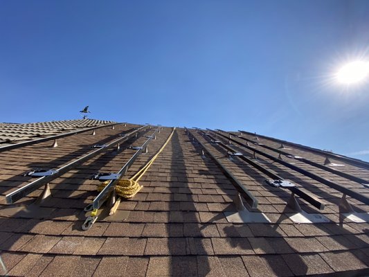 Camarillo Solar Installation - This solar electric project was quite a challenge having a 35° pitched roof and installing quite a few solar electric panels for approximately a $320 a month electric bill cost￼
We were all harnessed in and installed working with the roofer to make it completely watertight and as clean looking as possible￼