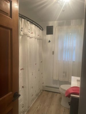 Pownel Remodel - This house had a long period of different maintenance unknown to the new homeowner. We came in and jacked the house up. Replaced floor structures and some wall framing. Then insulated, and rewired. We also relocated the washer and dryer. Installed new flooring, a walk-in shower, toilet, and vanity.