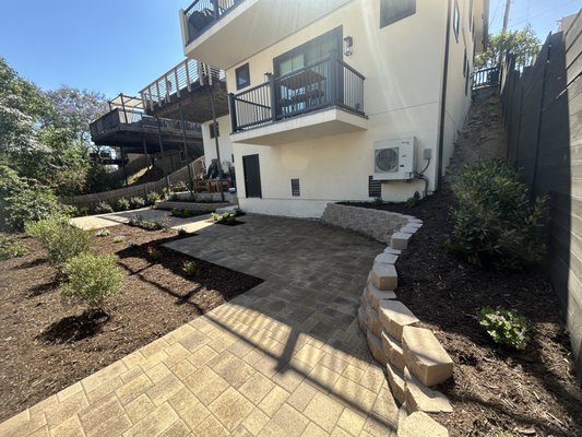 San Diego - What was once an unused dirt lot is now a stunning, functional outdoor space that combines beautiful paver installation with low-maintenance landscaping for lasting beauty and ease of care. San Diego - What was once an unused dirt lot is now a stunning, functional outdoor space that combines beautiful paver installation with low-maintenance landscaping for lasting beauty and ease of care.
