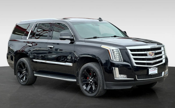 2016 CADILLAC ESCALADE - Bold, Refined, and Commanding – An Icon of Luxury & Performance

Step into sophistication with this 2016 Cadillac Escalade Luxury Sport Utility 4D, a high-end full-size SUV that seamlessly blends executive-class luxury with powerful performance. This black-on-black beauty exudes elegance, boasting a stunning Onyx Black exterior paired with a Jet Black leather interior, giving it an ultra-sleek and commanding presence on the road.