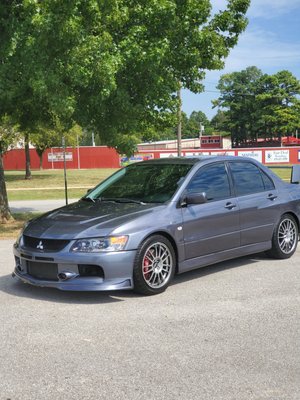 Full detail with paint correction and ceramic coating - This 2006 Mitsubishi Evo had rough paint and really needed a detail. After a full interior and exterior detail we gave it a 2-step paint correction with ceramic coating. It really brought the paint back to life, to the point that when it was entered in a car show the following week people were asking the owner if it was a brand new paint job! The car ended up winning a category at the car show too! Full detail with paint correction and ceramic coating - This 2006 Mitsubishi Evo had rough paint and really needed a detail. After a full interior and exterior detail we gave it a 2-step paint correction with ceramic coating. It really brought the paint back to life, to the point that when it was entered in a car show the following week people were asking the owner if it was a brand new paint job! The car ended up winning a category at the car show too!
