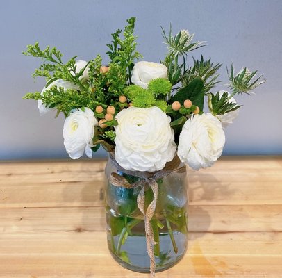 Winter Seasonal Arrangements - Our winter floral arrangements are festive for any winter occasion. Winter Seasonal Arrangements - Our winter floral arrangements are festive for any winter occasion.