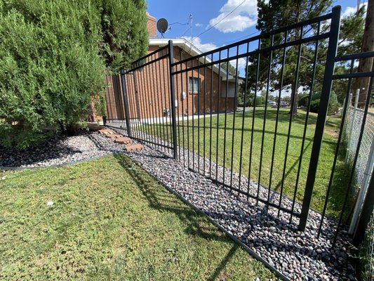 Landscaping Project: Edging and Decorative Rocks - For this landscaping Project the client wished to enhance her yard and we recommend adding decorative rocks to offer some variety and contrast.
