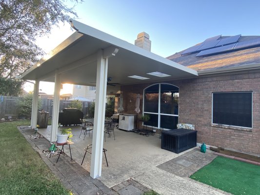Round Rock, TX - Solid Insulated Cover - Our customer here in Round Rock wanted to create a shade structure for the backyard, but didn't want to lose the natural light coming in through their window. Our inset skylights will keep that natural light shining in, and still allow for a wonderful shaded outdoor space. Round Rock, TX - Solid Insulated Cover - Our customer here in Round Rock wanted to create a shade structure for the backyard, but didn't want to lose the natural light coming in through their window. Our inset skylights will keep that natural light shining in, and still allow for a wonderful shaded outdoor space.