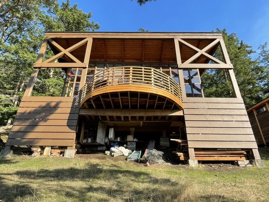 San Juan Islands Exterior Restoration - This old cabin was built in 1984 on Decatur Island in the San Juans, and was featured on the cover of sunset magazine because of its groundbreaking window architecture. The owners told us they "wanted to feel like they were outside, inside."
But now, 40 years later, it was time to restore this old cabin to its former glory. We re-sided the house with clear cedar and stained it brown. We sanded and re-stained all 97 windows, we sanded all of the soffits and stained them with a clear varnish.
We are proud to present such beautiful work to the San Juan Island community. San Juan Islands Exterior Restoration - This old cabin was built in 1984 on Decatur Island in the San Juans, and was featured on the cover of sunset magazine because of its groundbreaking window architecture. The owners told us they "wanted to feel like they were outside, inside."
But now, 40 years later, it was time to restore this old cabin to its former glory. We re-sided the house with clear cedar and stained it brown. We sanded and re-stained all 97 windows, we sanded all of the soffits and stained them with a clear varnish.
We are proud to present such beautiful work to the San Juan Island community.