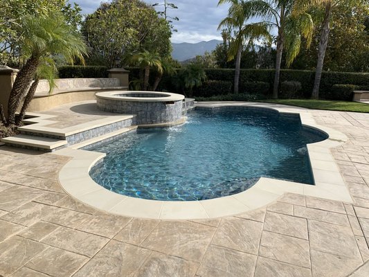Pool & Spa Remodel - Dos Vientos - This remodel was in Dos Vientos. We removed old pour in place coping, tile and plaster and gave it a more clean updated modern look. Products used were Bellecrete glacier white coping, NPT tile and Stonescapes Tropics Blue Mini Pebble. Pool & Spa Remodel - Dos Vientos - This remodel was in Dos Vientos. We removed old pour in place coping, tile and plaster and gave it a more clean updated modern look. Products used were Bellecrete glacier white coping, NPT tile and Stonescapes Tropics Blue Mini Pebble.