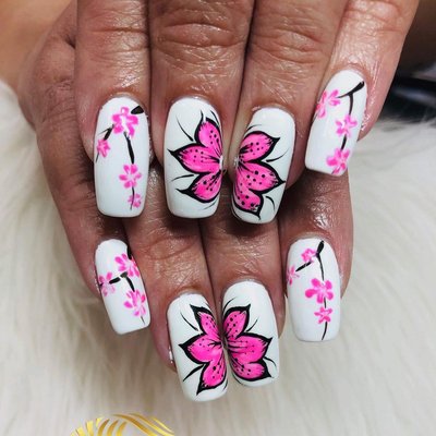 Nail Art Designs - Express your style with our creative nail art designs. From elegant patterns to bold statements, our skilled technicians use quality products to craft unique, eye-catching looks personalized just for you.