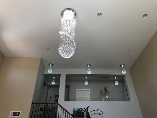 Ceiling light fixture - We added boxes & wiring to some locations to make all 7 lights line up, we put together all the individual crystals for the fixtures. This was a fulfilling project once we finished because of all the detail that went into putting the fixtures together. Ceiling light fixture - We added boxes & wiring to some locations to make all 7 lights line up, we put together all the individual crystals for the fixtures. This was a fulfilling project once we finished because of all the detail that went into putting the fixtures together.