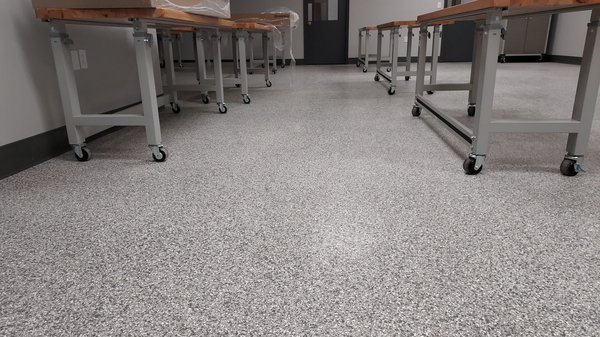 Office complex coatings-- 2022 - Removal of existing carpet, tile, and VCT . We used our 894 lb. grinder to profile existing concrete and repaired cracks as needed and applied our coatings with our base coat, color selected was Slate Stone, and we followed with our top coat. This was offices, baths, locker area, lunch area, etc. Office complex coatings-- 2022 - Removal of existing carpet, tile, and VCT . We used our 894 lb. grinder to profile existing concrete and repaired cracks as needed and applied our coatings with our base coat, color selected was Slate Stone, and we followed with our top coat. This was offices, baths, locker area, lunch area, etc.