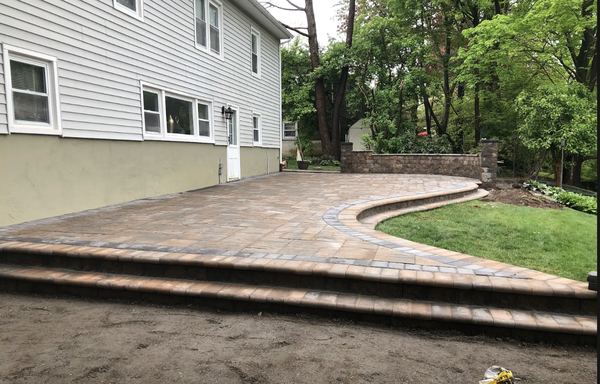 Backyard Masonry Service - EM Paving Masonry delivers top-quality paving and masonry services for homes and businesses. Our skilled team specializes in custom driveways, walkways, patios, retaining walls, and stonework—all designed to enhance curb appeal and add lasting value. From modern concrete to classic brick and natural stone, we combine expert craftsmanship with durable materials to create beautiful, functional outdoor spaces. Explore our portfolio to see the difference EM Paving Masonry can make!