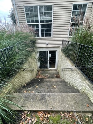 Concrete wash - Before and after basement concrete walkway wash