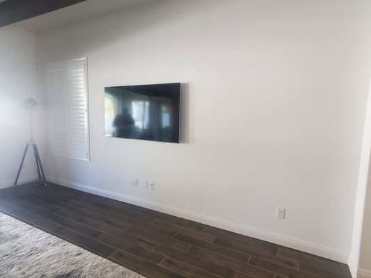Fireplace Niche 2024 - This homeowner wanted a custom natural stone accent wall for their electric fireplace and television.