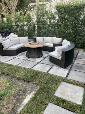 Coral Gables Residence Yard Renovation, 2021 - We remodeled the front, both sides, and back yard of this Coral Gables home. We added custom planters and a seating area with surrounding hedges.