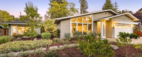 631 La Mesa Drive, Portola Valley - Beautifully Remodeled Jewel in Sought-After Neighborhood
5 Beds
3 Full Baths
1 Half Baths
House Size 2,937 Sq. Ft.
Lot Size 10,192 Sq. Ft.
The sought-after Ladera neighborhood provides the perfect setting for this beautifully remodeled 5-bedroom, 3.5-bathroom home set on a verdant lot of nearly one-quarter acre. A slate pathway past the landscaped garden entrance leads to the front door, and once inside, stunning walls of windows reach to the tops of soaring ceilings and bring the outside in, while hardwood floors extend throughout over 2,900 square feet of modern living space. The floorplan offers excellent space for both entertaining and everyday living, highlighted by the living room with a fireplace, the incredible chef’s kitchen with high-end appliances from Miele and BlueStar, and the office with comfortable space to meet all work-from-home needs. This home takes full advantage of its incredible setting in this close-knit community, and is just moments from the Ladera Recreation District where kids and adults can enjoy activities including swimming, tennis, yoga, and more. Plus, you will be just a short drive from downtown Palo Alto and Stanford University and have access to the acclaimed Las Lomitas school district. 631 La Mesa Drive, Portola Valley - Beautifully Remodeled Jewel in Sought-After Neighborhood
5 Beds
3 Full Baths
1 Half Baths
House Size 2,937 Sq. Ft.
Lot Size 10,192 Sq. Ft.
The sought-after Ladera neighborhood provides the perfect setting for this beautifully remodeled 5-bedroom, 3.5-bathroom home set on a verdant lot of nearly one-quarter acre. A slate pathway past the landscaped garden entrance leads to the front door, and once inside, stunning walls of windows reach to the tops of soaring ceilings and bring the outside in, while hardwood floors extend throughout over 2,900 square feet of modern living space. The floorplan offers excellent space for both entertaining and everyday living, highlighted by the living room with a fireplace, the incredible chef’s kitchen with high-end appliances from Miele and BlueStar, and the office with comfortable space to meet all work-from-home needs. This home takes full advantage of its incredible setting in this close-knit community, and is just moments from the Ladera Recreation District where kids and adults can enjoy activities including swimming, tennis, yoga, and more. Plus, you will be just a short drive from downtown Palo Alto and Stanford University and have access to the acclaimed Las Lomitas school district.