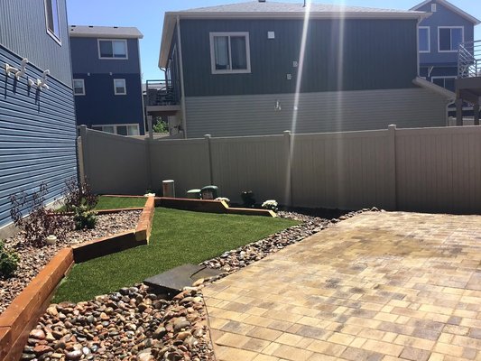 "Dog Friendly Backyard" - We know our little friends are part of our family and they deserve a great place to enjoy! In this project, we prioritized low maintenance and durable materials. We installed pet specific artificial turf, extended the patio with pavers and provided an easy poop scoop gravel area. Let us help you to provide your pet with an easy maintenance solution today! "Dog Friendly Backyard" - We know our little friends are part of our family and they deserve a great place to enjoy! In this project, we prioritized low maintenance and durable materials. We installed pet specific artificial turf, extended the patio with pavers and provided an easy poop scoop gravel area. Let us help you to provide your pet with an easy maintenance solution today!
