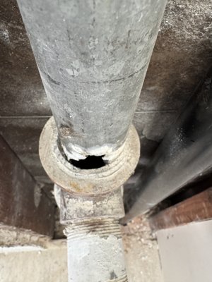Drywall Patch Work - I installed a vent system for plumbing and had to open the soffit to gain access. These images are of the finished patching, with paint included.