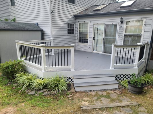 Deck Repair & Restoration - This deck restoration was done installing new composite decking and viny railing