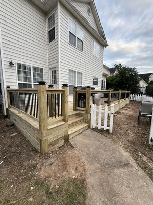 Pressure Treated Deck Rebuild Augusta Street - We rebuilt this 500 square foot deck with premium pressure treated decking and pressure treated hand railing with aluminum balusters. We added post cap lights with photocells to add some lighting for when the sun sets. Overall, the customers were very pleased with our professionalism and craftsmanship. Pressure Treated Deck Rebuild Augusta Street - We rebuilt this 500 square foot deck with premium pressure treated decking and pressure treated hand railing with aluminum balusters. We added post cap lights with photocells to add some lighting for when the sun sets. Overall, the customers were very pleased with our professionalism and craftsmanship.